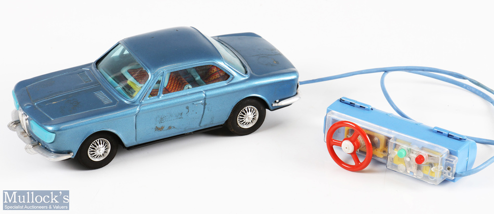 1960s Bandai, Japan Tinplate Remote Controlled BMW 2000 CS Car with light blue body and detailed