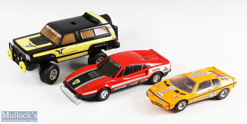 3 Remote-Controlled Large-Scale Cars inc Derwoo, Taiwan Ferrari 308GTB, Hong Kong made BMW M1 and