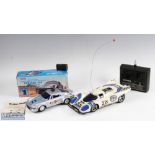 2 Remote Controlled Porsche Racing Cars inc Tandy sonic controlled Porsche 930 10" car, in