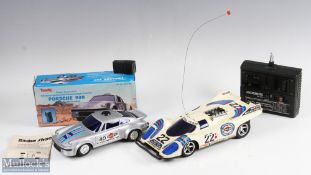 2 Remote Controlled Porsche Racing Cars inc Tandy sonic controlled Porsche 930 10" car, in