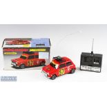 Nikko 1981 Radio Controlled Mini Cooper Rally Car Boxed with red body and rally decals, good