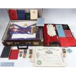 A Collection of Masonic Medals, Aprons, Sash, Gloves Booklets and paperwork, all housed within a