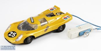 Gama, West Germany 1:12 Scale Porsche 917 Racing Car in yellow/gold colour with Elf decals with