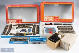 Marklin Ho Locomotive Train Sets to include a boxed S 2920 locomotive with coach and transformer, an