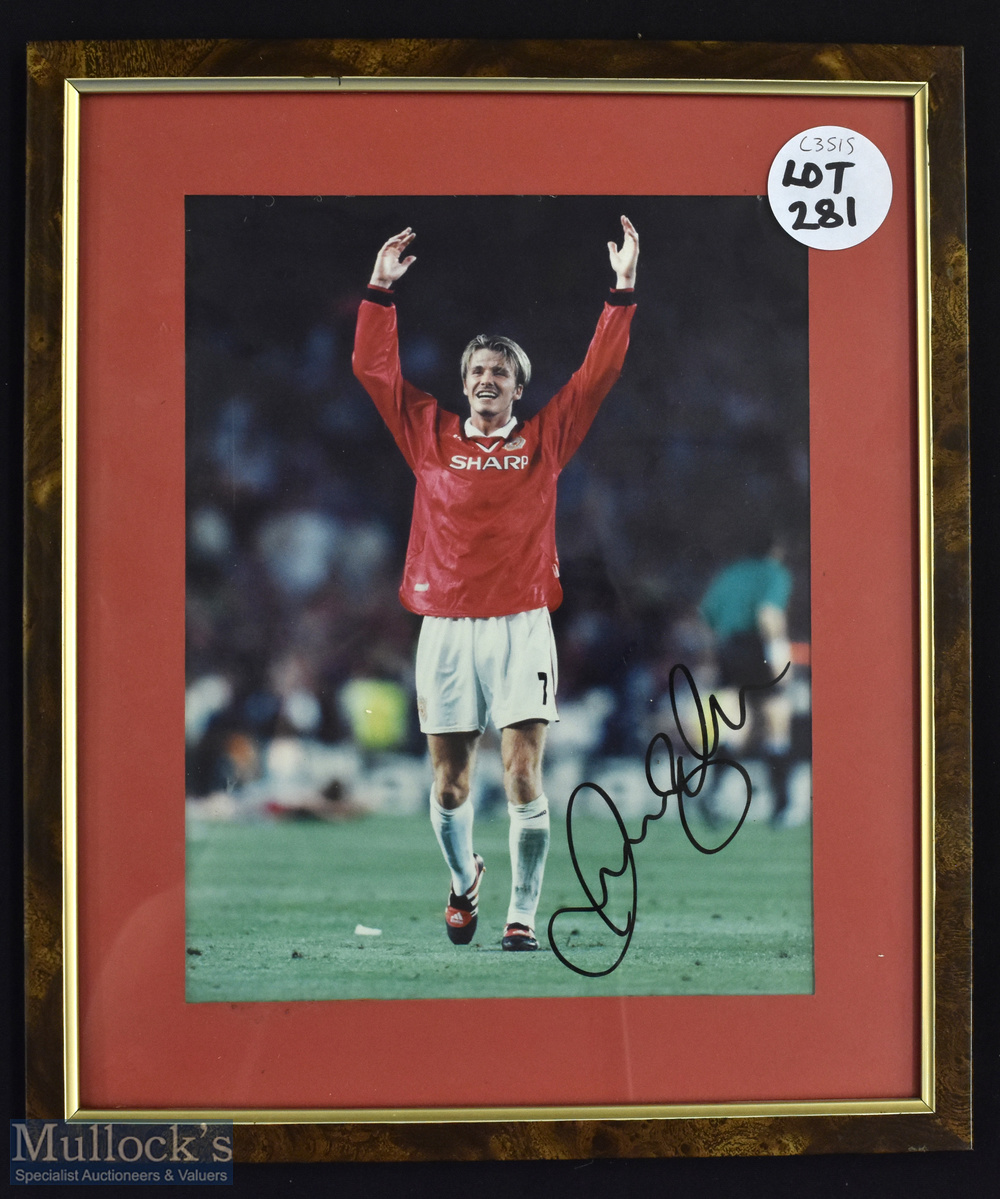 Manchester United David Beckham Signed Photograph, mounted and framed under glass size is 27.5cm x