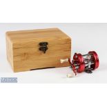 ABU Ambassadeur 2500C multiplier reel in nostalgia red foot stamped 070008, twin pearl handles,