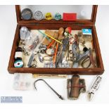 A treasure trove of fishing accessories in a large (19" x 13" x 4" approx.) glass topped case, to