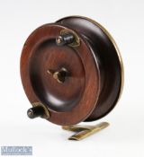 Unusual brass and wood 4 ½" side casting reel stamped 'prov pat no 35295', with spring loaded