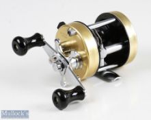 ABU Ambassadeur 2500CI multiplier reel in gold colour numbered to foot 060006, small black arbour,