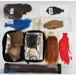 Fly Tying Fishing Capes, Feathers Furs, to include a stone bag with assorted furs, a collection of