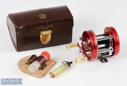 ABU Ambassadeur 5000 multiplier reel in red c1960s numbered to foot 288658, with twin marbled