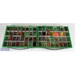 A plastic display case with 32 compartments with trout dry flies, made up of March brown invicta /