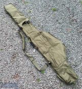 Tracker Fishing Rod Bag, a heavy padded green canvas with multi pockets and shoulder strap
