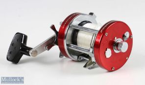 ABU Ambassadeur 7000CS proRocket multiplier reel, in red, numbered to foot, 090010 11, sliding