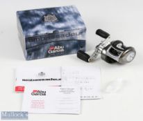 ABU Garcia Ambassadeur Orra SX-HS multiplier reel, in grey finish, twin handle with drag adjuster,