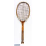 c1900 T M Gardiner Ltd of Hoddesdon" Association" Fishtail Wooden Tennis Racket, with gut strings,