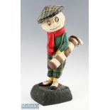 Dunlop Caddy advertising golf figure appears with signs of restoration on naturalistic splayed base,