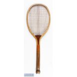 c1900 Wills & Co of Oldham Wooden Fishtail "Tennis racket ", with convex wedge, gut strings weight