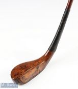 McEwan faintly stamped light stained beech wood curved face Shortspoon c1885- with full brass sole