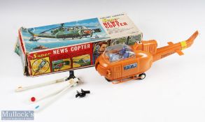 SH, Japan Battery Operated Super News Copter Boxed with orange body, working from flaps, rotor