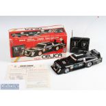 Taiyo, Japan Toyota Celica Racing Remote Controlled Car in black with racing decals, with paperwork,