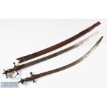Two 19th centuryIndian Talwar swords one having knuckle guard and scabbard, blade length 77cm, the
