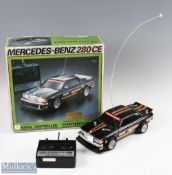 Nikko Radio Controlled Mercedes Benz 280CE 1/14 Scale Car in black Boss livery with controller,