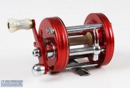 ABU Ambassadeur 6000 multiplier reel in red c1960s transitional model, no number to foot, marbled