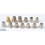 Group of 12 assorted silver thimbles, with mixed designs and makers including Charles Horner