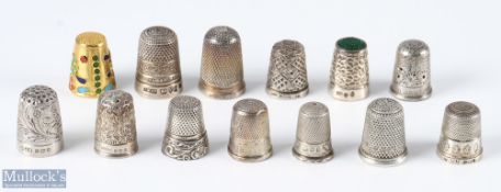 Group of 12 assorted silver thimbles, with mixed designs and makers including Charles Horner