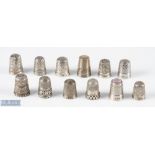 Group of 12 assorted hallmarked silver thimbles, with mixed designs and makers including Charles