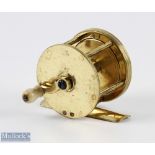 D Murray 2 1/4" brass crank wind reel, white handle, stamped makers mark rear plate, brass foot