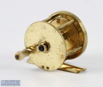 D Murray 2 1/4" brass crank wind reel, white handle, stamped makers mark rear plate, brass foot