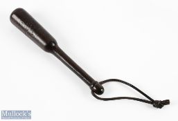 Unnamed lignum trout priest, well used, fine patina, acorn to handle base with leather strap