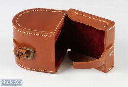Hardy Bros block leather 'D' shape 3 1/8" reel case, tan leather with contrasting stitching, looks