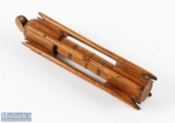 A rare 19th treen (box wood) float and line compendium, outer section with 6x carved cast holders,