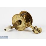 Scarce 19th century small 1 1/2" brass spike winch reel, white handle with brass wing nut, no