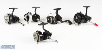 A collection of 5x reels, all showing signs of wear and requiring some attention - South Bend,