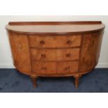 1950s WALNUT D SHAPED SIDEBOARD with a raised back above three cockbeaded central drawers, flanked