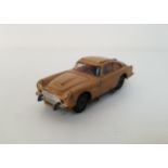 CORGI JAMES BOND ASTON MARTIN DB5 DIE CAST VEHICLE from the film Goldfinger, finished in gold,