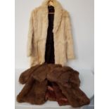 FOUR LADIES CONEY FUR COATS in brown, camel and cream, together with another fawn fur coat (4)