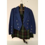 GENTLEMAN'S HIGHLAND DRESS comprising a Mackenzie kilt, Prince Charlie blue jacket and a leather