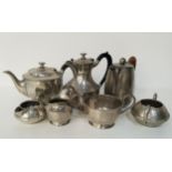 MIXED LOT OF HAMMERED PEWTER comprising two chocolate pots, tea and coffee pots, hot water pots,