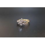 DIAMOND CLUSTER RING the round and marquise cut diamonds totaling approximately 0.6cts, on