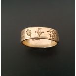 NINE CARAT GOLD 'FREE DERRY' RING decorated with various motifs, ring size X and approximately 8.1