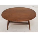 ERCOL OAK OCCASIONAL TABLE with an oval top, standing on turned supports united by a slatted