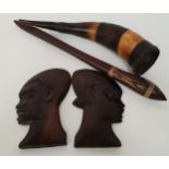 PAIR OF CARVED AFRICAN HEADS of men in profile, 18.5cm high, shaped and painted tribal mace, 46cm