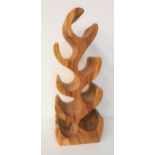 CHELSEA HOME & LEISURE TEAK WINE RACK of one piece construction, to hold eight bottles, 70cm high