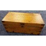 19TH CENTURY CAMPHOR WOOD TRUNK with brass bound corners, recessed handle to the lift up lid and