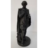 LARGE SPELTER FIGURE OF SHAKESPEARE the pensive figure standing beside a pile of books, on